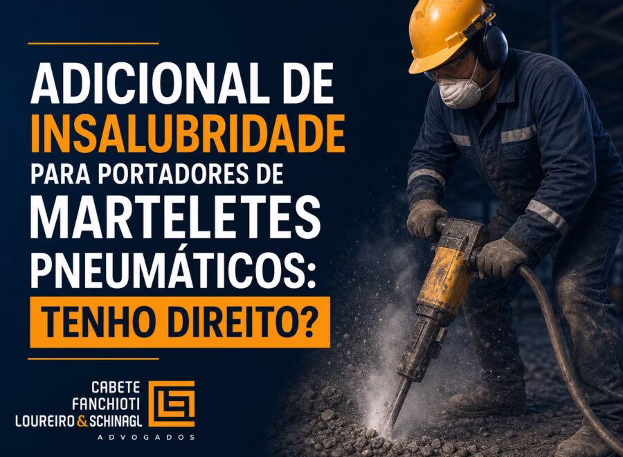 Trabalhador usando martelete pneumático em obra, ilustrando o direito ao adicional de insalubridade